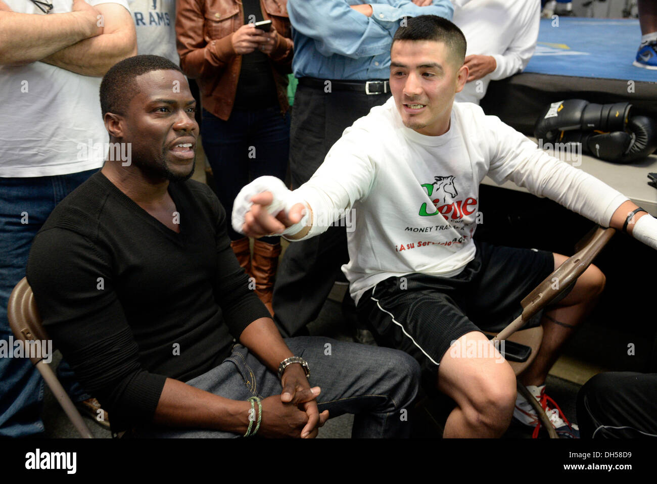 Oxnard, CA, USA. 31st Oct, 2013. R.) Former world champion BRANDON ''Bam Bam'' RIOS is visit by Actor Kevin Hart, who stars as a savvy boxing promoter in the upcoming Warner Bros. Pictures movie ''Grudge Match during his his only U.S. Media Workout Thursday, October 31, at the Robert Garcia Boxing Academy. Rios is in deep training for his eagerly-anticipated welterweight collision with Fighter of the Decade, Congressman MANNY ''Pacman'' PACQUIAO. Rios departs for Macau on November 11 to acclimate to the environment. The fight between Pacquiao vs. Credit:  ZUMA Press, Inc./Alamy Live News Stock Photo