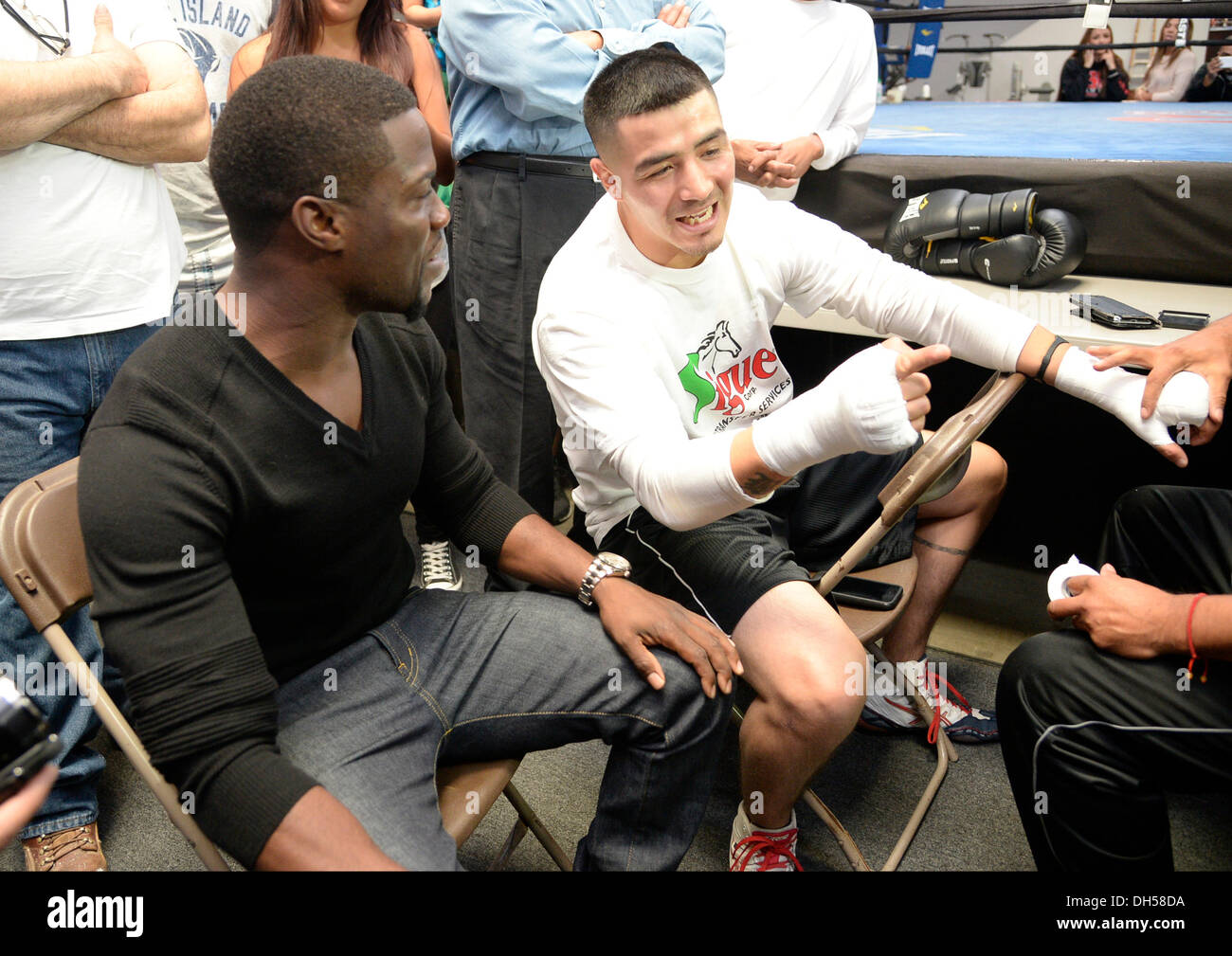 Oxnard, CA, USA. 31st Oct, 2013. R.) Former world champion BRANDON ''Bam Bam'' RIOS is visit by Actor Kevin Hart, who stars as a savvy boxing promoter in the upcoming Warner Bros. Pictures movie ''Grudge Match during his his only U.S. Media Workout Thursday, October 31, at the Robert Garcia Boxing Academy. Rios is in deep training for his eagerly-anticipated welterweight collision with Fighter of the Decade, Congressman MANNY ''Pacman'' PACQUIAO. Rios departs for Macau on November 11 to acclimate to the environment. The fight between Pacquiao vs. Credit:  ZUMA Press, Inc./Alamy Live News Stock Photo