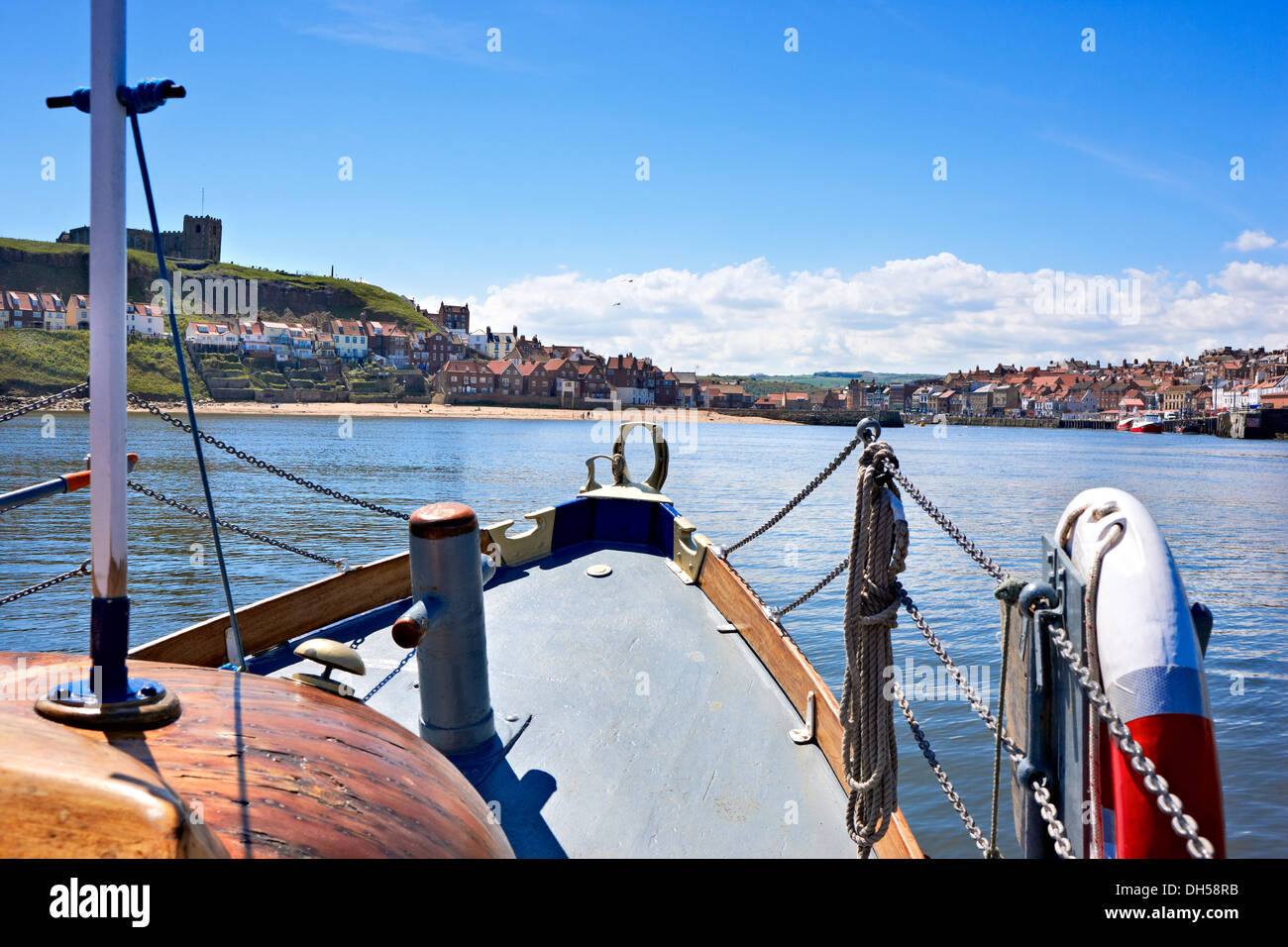 Coming into Whitby Harbour - North Yorkshire coastal town UK Stock Photo