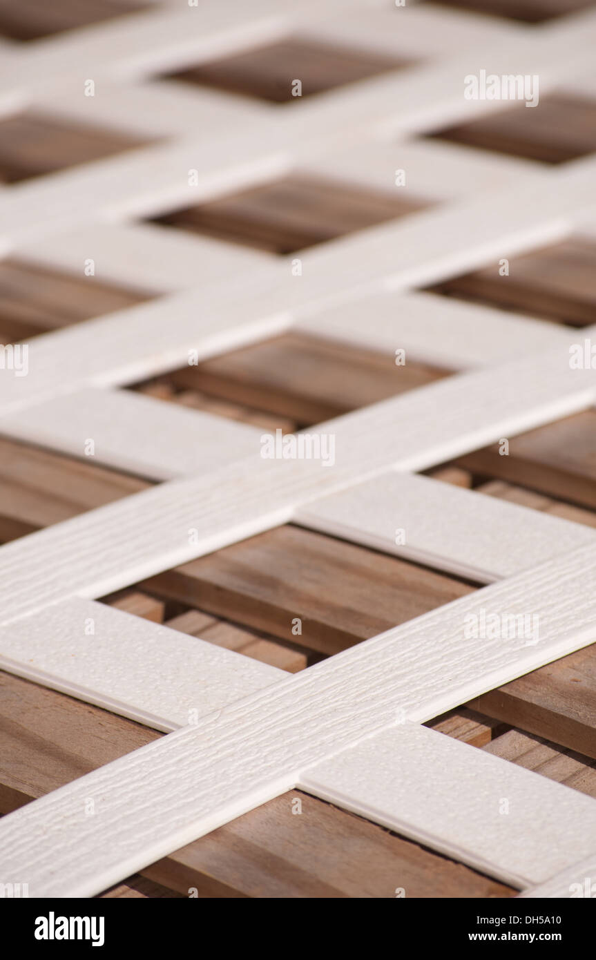 Pattern of a white plastic lattice board Stock Photo