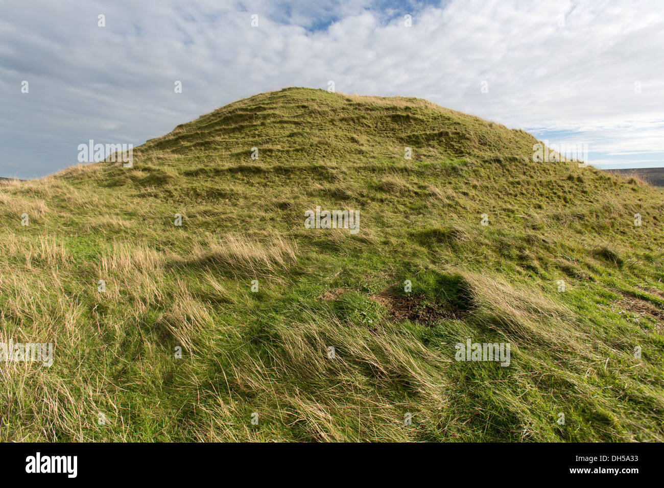 Islands of Orkney, Scotland. Picturesque view of the grassy mound that