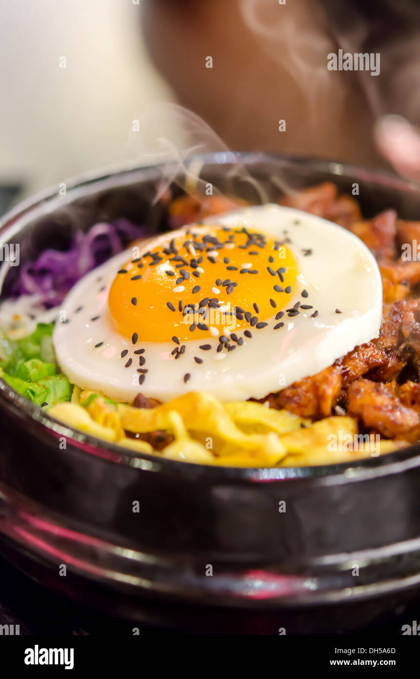 bibimbap in a heated stone bowl , korean style food Stock Photo Alamy