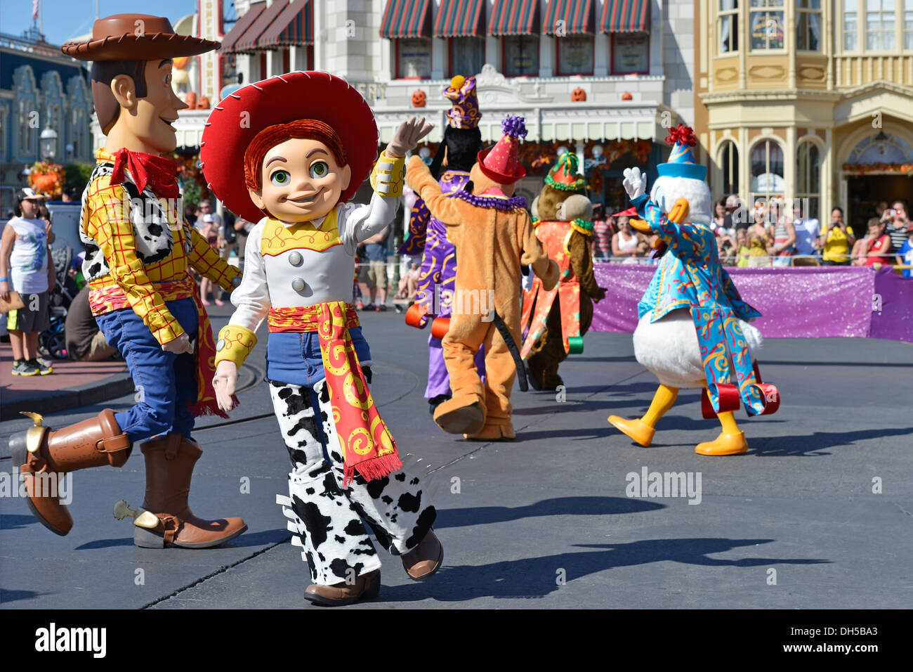 Woody and Jessie of Toy Story & other Disney Characters in a Parade, Magic Kingdom, Disney World Resort, Orlando Florida Stock Photo