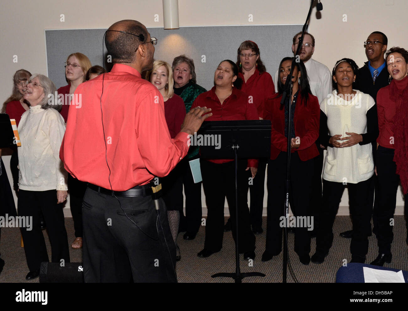 choir director directing singers in a choir Stock Photo Alamy