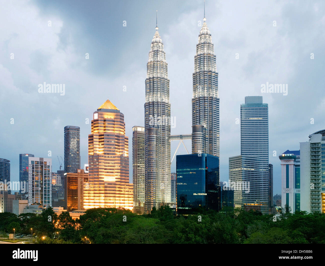 Skyline in the evening, Petronas Twin Towers, Kuala Lumpur, Malaysia Stock Photo