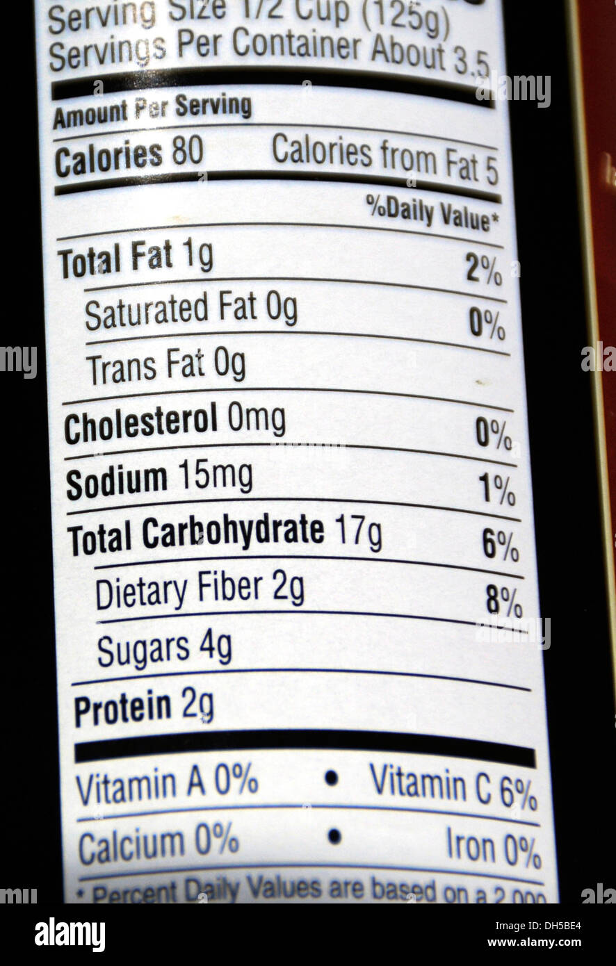 Nutrition information on the back of canned food Stock Photo