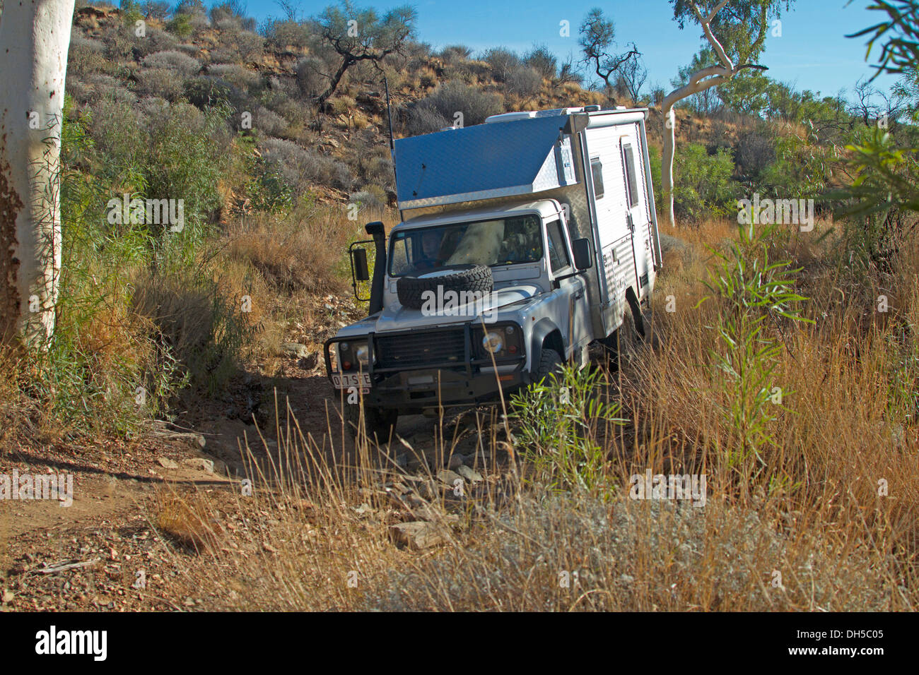 Four wheel drive vehicle / Campervan on rugged Australian outback track in Northern Territory Stock Photo