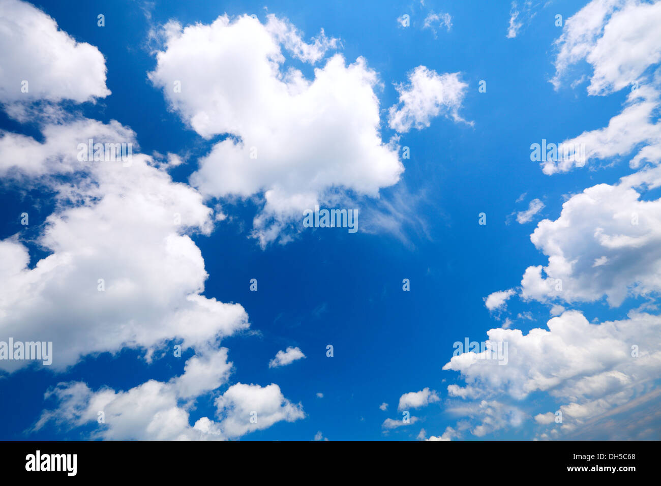 Deep blue sky background with white clouds Stock Photo Alamy