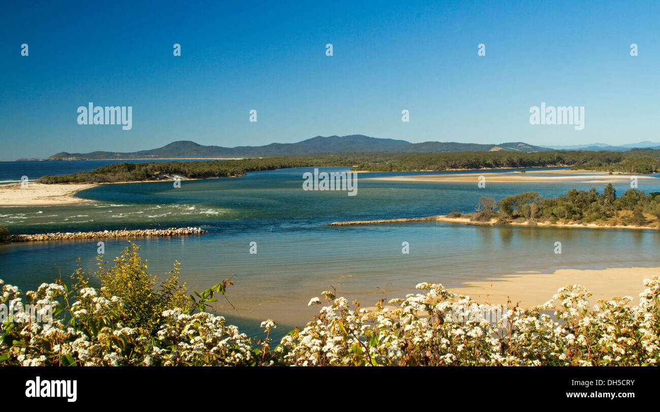Spectacular panoramic view of coast, sandy beaches, extensive river estuary, and distant ranges from lookout at Nambucca Heads in NSW Australia Stock Photo