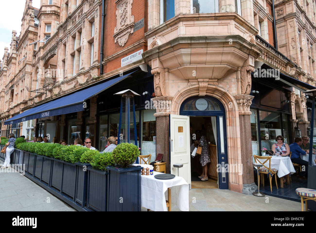 George restaurant on the corner of Mount Street, Mayfair, London, England, UK Stock Photo