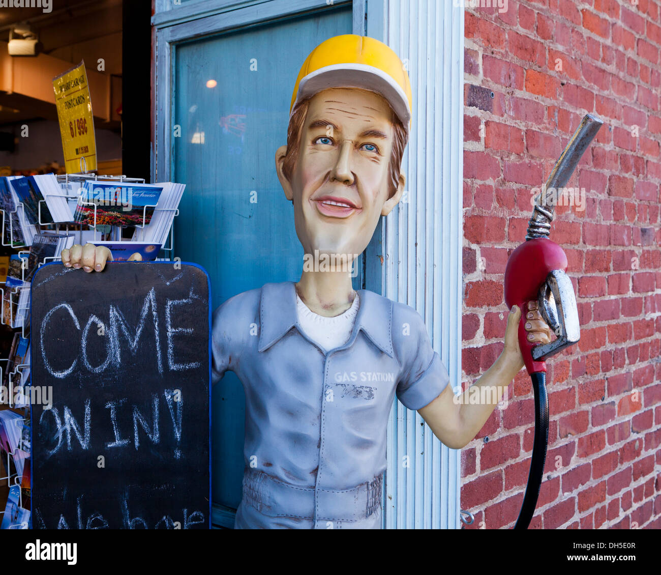 A gas station attendant sculpture holding a fuel pump - USA Stock Photo