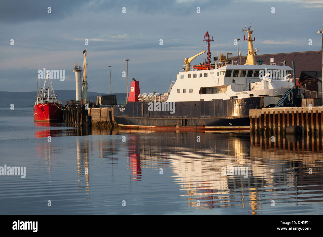 Islands of Orkney, Scotland. Picturesque early evening view of the ferry MV Earl Sigurd alongside Kirkwall’s harbour. Stock Photo