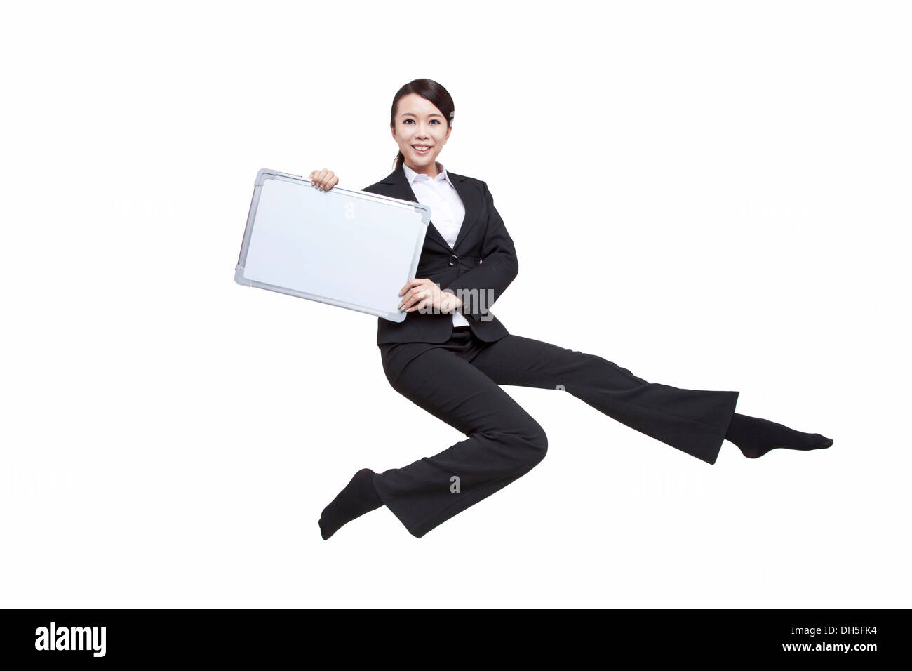 Young Business Woman holding a pen Stock Photo - Alamy