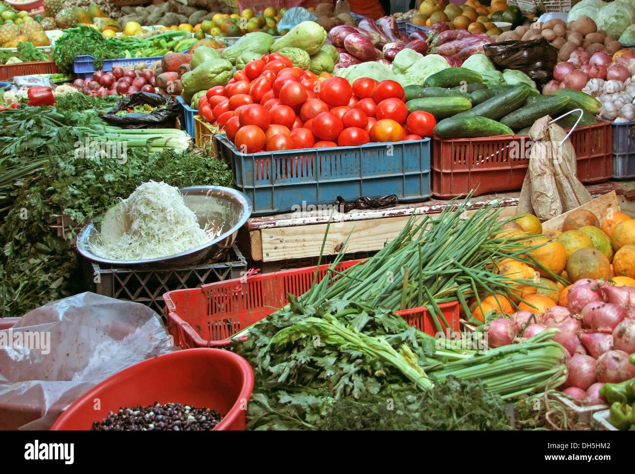 detail of a market stall with lots of various colorful fruits and vegetables Stock Photo