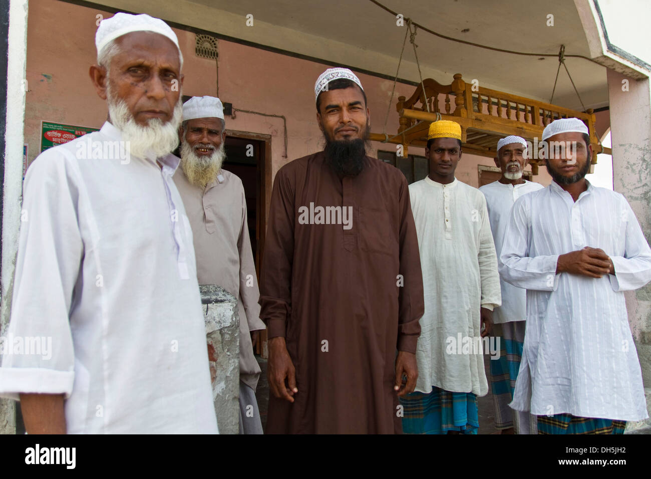 Group of Muslim men standing in front of a mosque, Gabura, Sundabarns, Khulna District, Bangladesh, South Asia, Asia Stock Photo