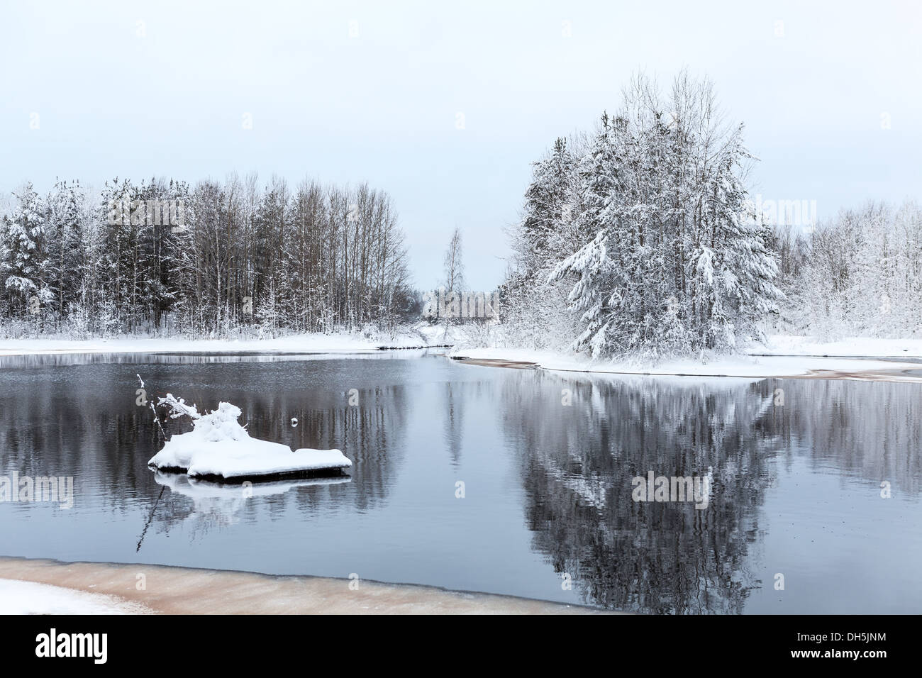 Warm lake in forest during strong freeze. Karelia, Russia Stock Photo