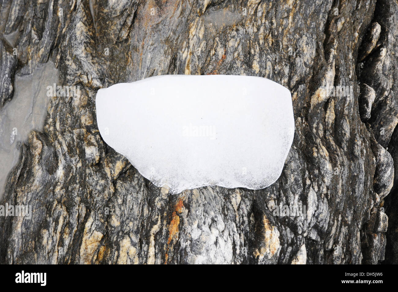 Ice on rock Stock Photo Alamy