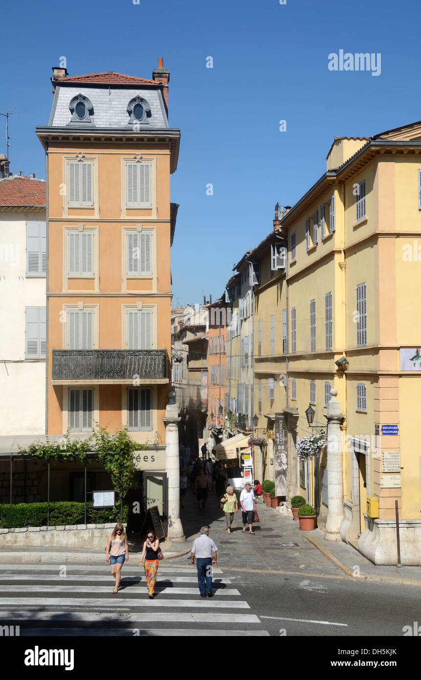 Main Street, Rue Jean Ossola,  & Tourists Visiting the Old Town or Historic District Grasse Alpes-Maritimes France Stock Photo
