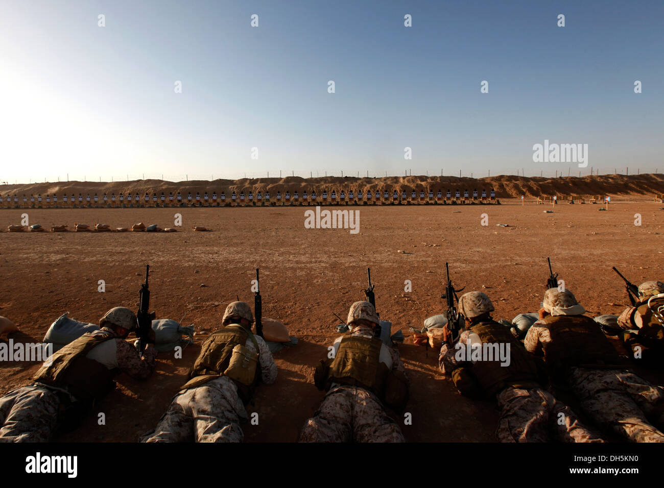U.S. Marines with Headquarters, 2nd Marine Aircraft Wing (Forward), conduct a Battle Sight Zero (BZO) range at Camp Leatherneck, Helmand province, Afghanistan, Oct. 25, 2013. A BZO was performed to maintain proficiency with the M16/M4 service rifles issue Stock Photo