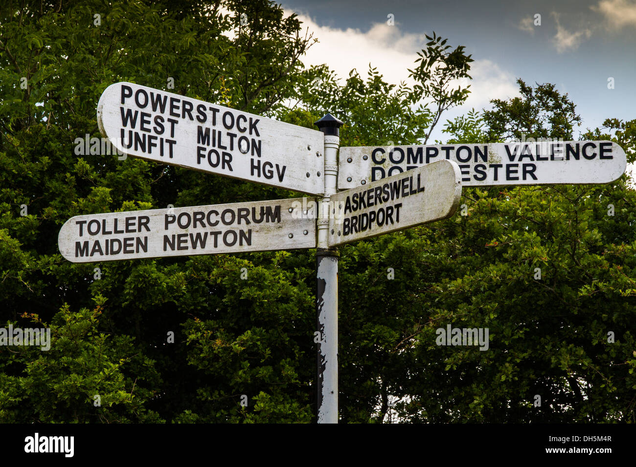 English  Place Names (sign) Finger post showing some unusual sounding place names in Dorset, England, United Kingdom. Stock Photo