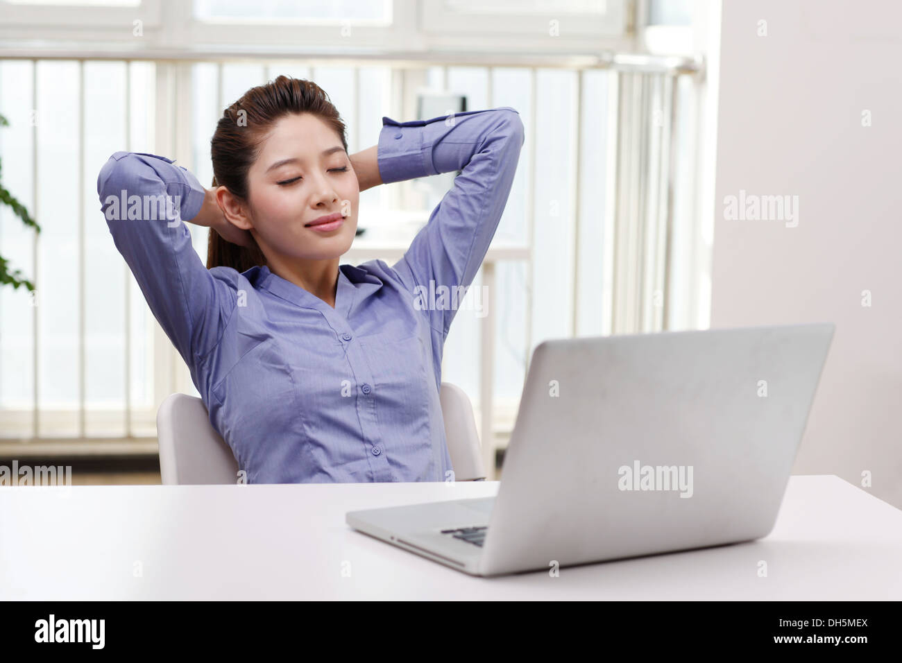 Closed eyes on chair hi-res stock photography and images - Alamy