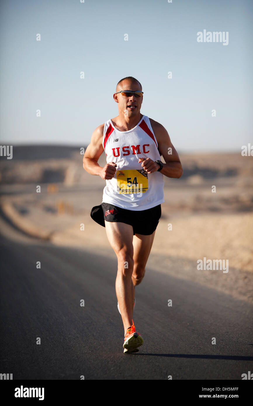 Capt. Pedro Rodriguez runs the 26.2 mile course of the Marine Corps Marathon Forward at Camp Leatherneck, Afghanistan Oct. 27. Rodriguez finished second with a personal record time of 2:47:11. This was Rodriguez's second marathon. Stock Photo