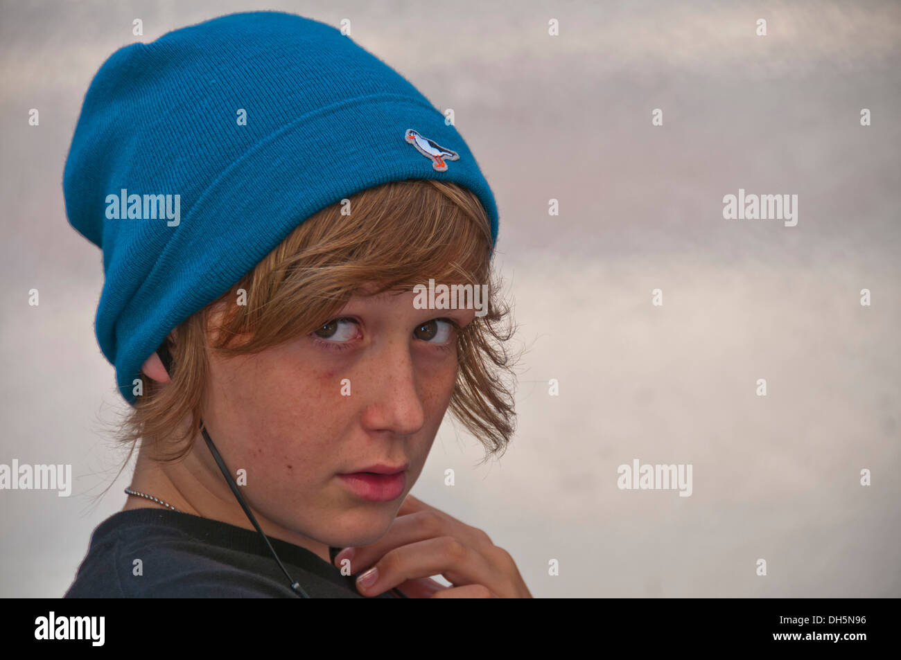 Boy, 12 years, with puzzled look on face portrait Stock Photo