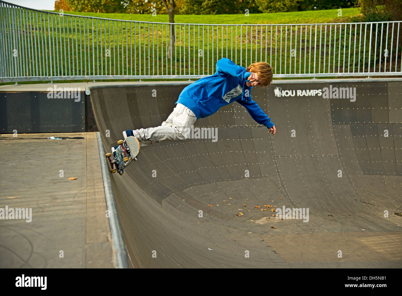 Twelve-year-old skater, Lohserampe skateboard track in Cologne, North Rhine-Westphalia, PublicGround Stock Photo