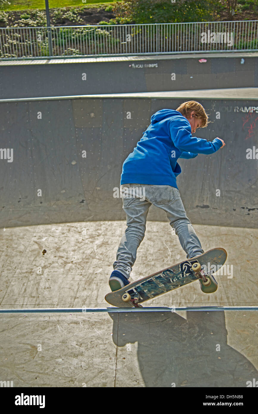 Twelve-year-old skater, Lohserampe skateboard track in Cologne, North Rhine-Westphalia, PublicGround Stock Photo