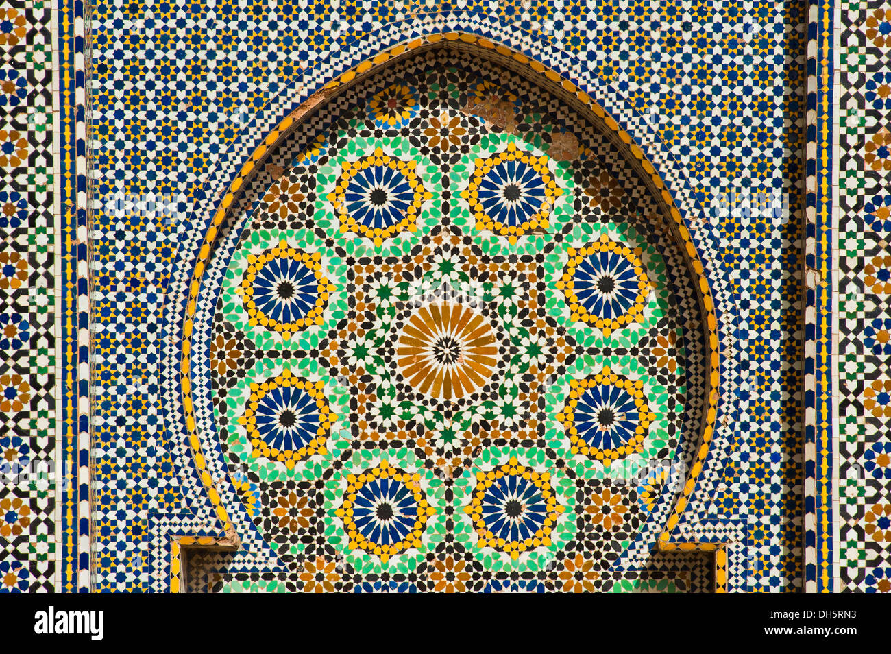 Tile mosaics, zellige, zillij or zellij tilework, on a fountain, Meknes