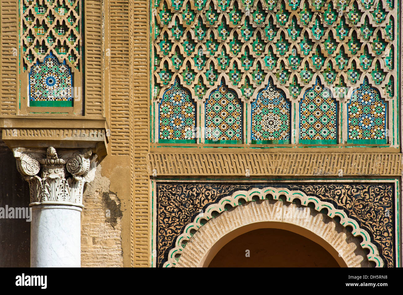 Columns with decorations and tile mosaics, zellige, zillij or zellij tilework on the Bab Mansour gate, medina, Meknes, Morocco Stock Photo