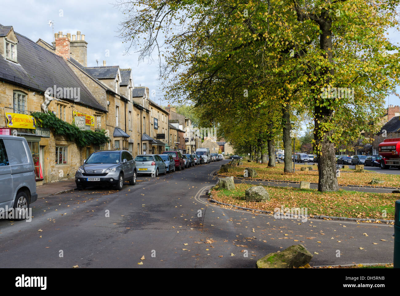 Row of shops MoretoninMarsh High Street in the Cotswolds Stock Photo