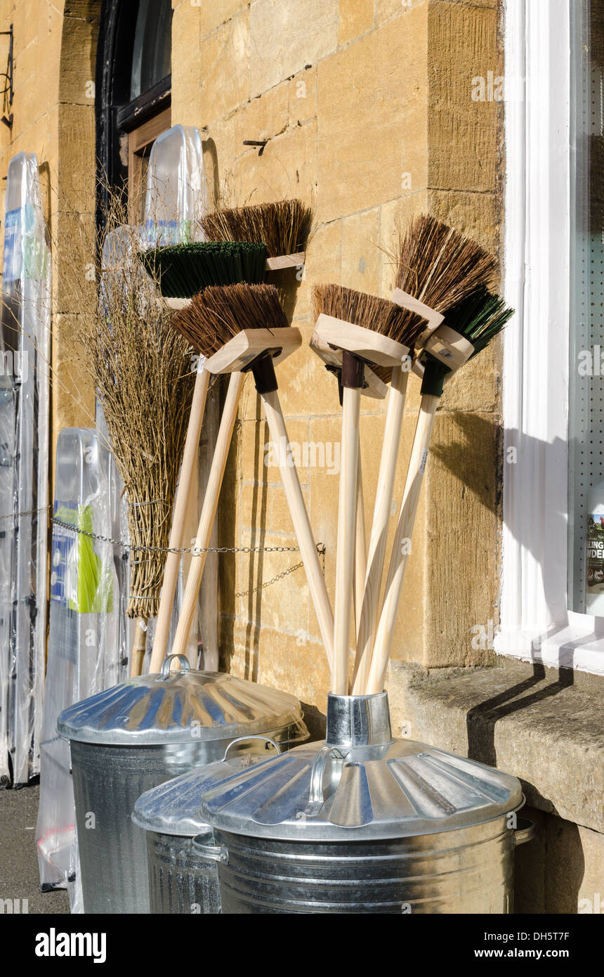 Display of brooms and brushes outside a hardware shop Stock Photo Alamy