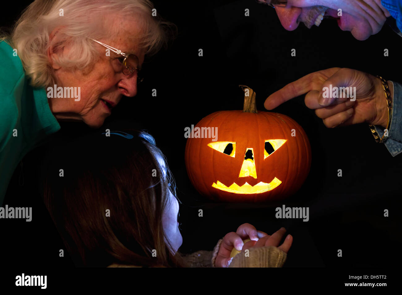 Halloween Pumpkin with young Downs Syndrome Girl. Stock Photo