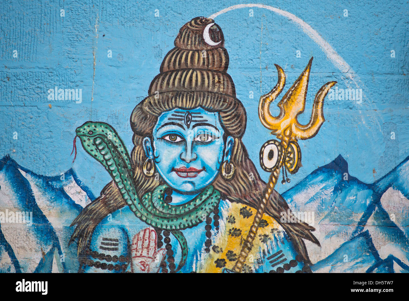 The Hindu god Shiva painted on the wall of a house on the banks of the Ganges River, Varanasi, Uttar Pradesh, India Stock Photo