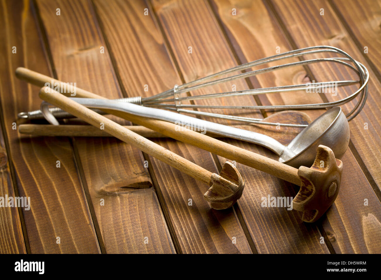 old kitchenware on wooden table Stock Photo