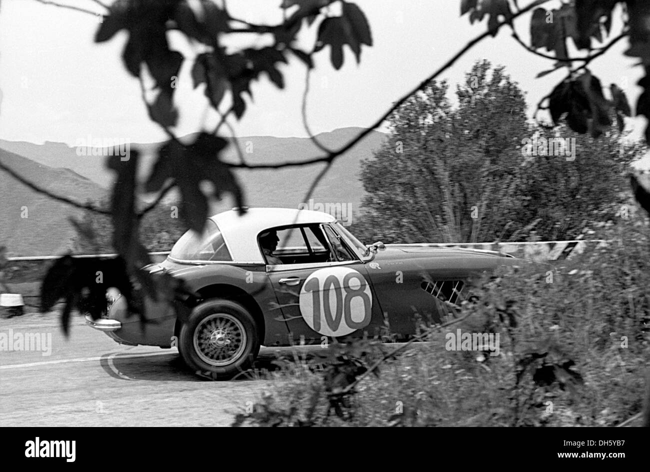 Timo Makinen-Paul Hawkins' Austin Healey 3000 racing in the Targa Florio, Sicily 1965. Stock Photo