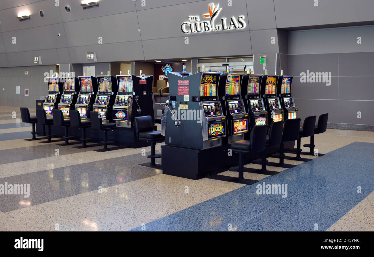 Slot machines in the waiting area, casino, Terminal 3, McCarran International Airport, Las Vegas, Nevada, USA Stock Photo