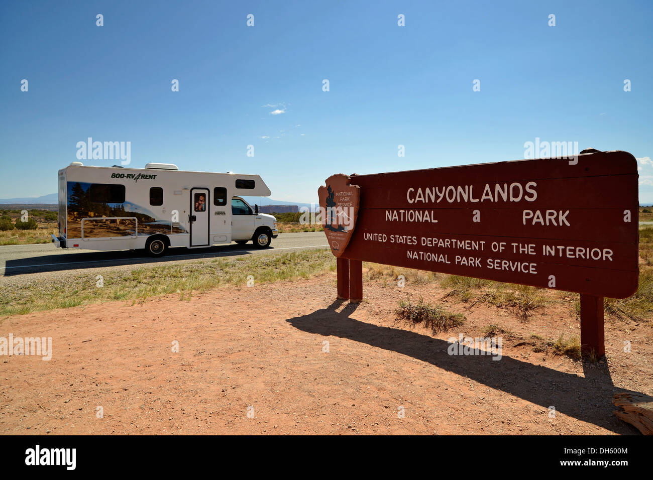 Caravan beside the entrance sign, Island in the Sky District, Canyonlands National Park, Utah, United States of America, USA Stock Photo