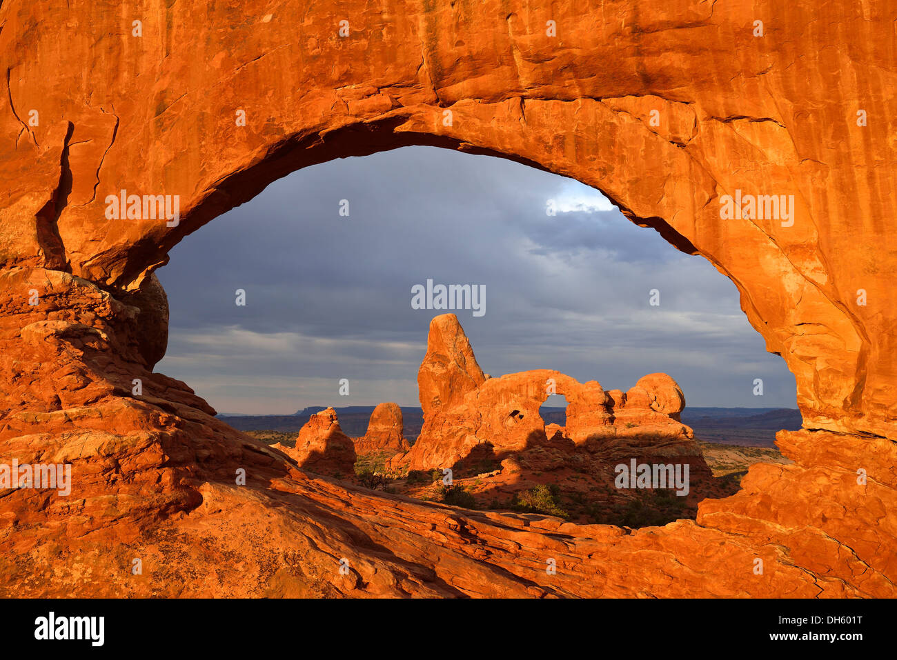 Early morning mood at Turret Arch seen through North Window, Windows Section, Arches National Park, Moab, Utah Stock Photo