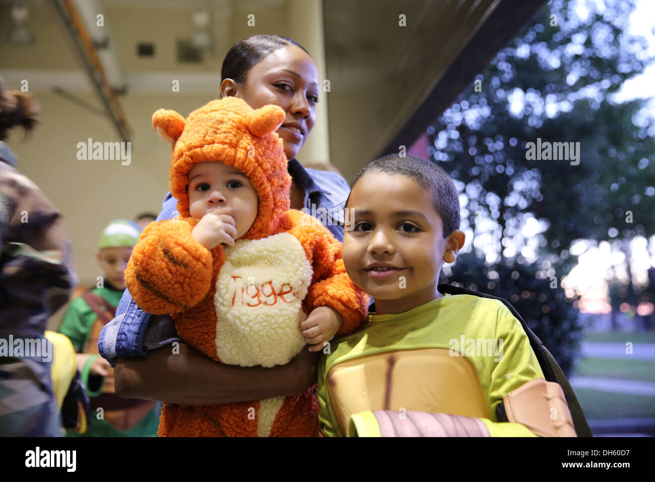 Sharona Russell enjoys the Center for Naval Aviation Technical Training Halloween party with her children Oct. 25 aboard the air station. Keep your children close while out trick-or-treating or enjoying Halloween festivities at the air station today. Stock Photo
