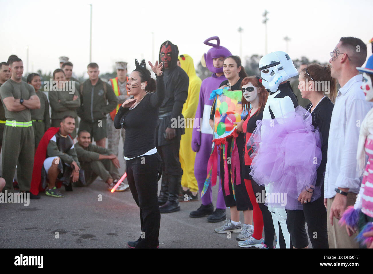 Gunnery Sgt. Joanna H. Mendoza, Headquarters Company gunnery sergeant, Combat Logistics Regiment 17, 1st Marine Logistics Group, holds a costume competition at the end of a Halloween-themed physical training circuit aboard Camp Pendleton, Calif., Oct. 30, Stock Photo