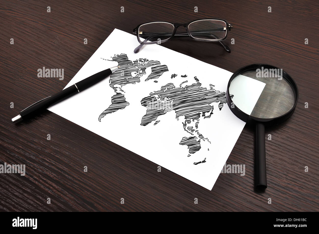 workplace with drawing world map on paper Stock Photo