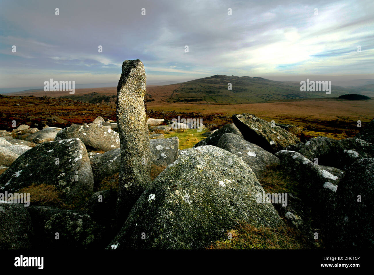 Standing Stone on Roughtor, Rough Tor, Bodmin Moor with Brown Willy in background Stock Photo