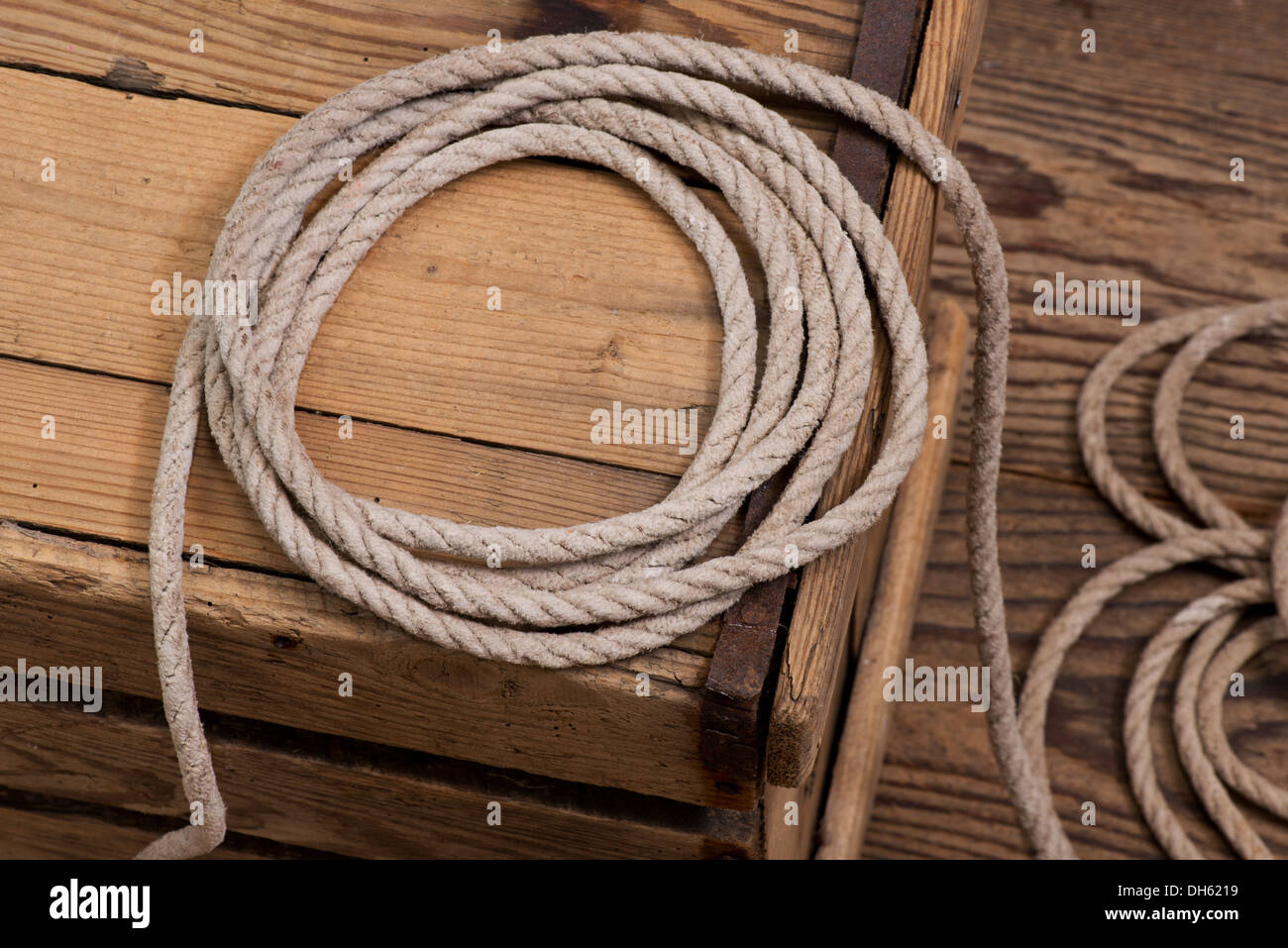 a used old rope in the workroom Stock Photo - Alamy