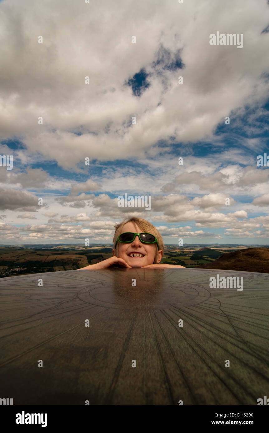 Boy and viewpoint marker on the middle Eildon, Melrose Stock Photo - Alamy