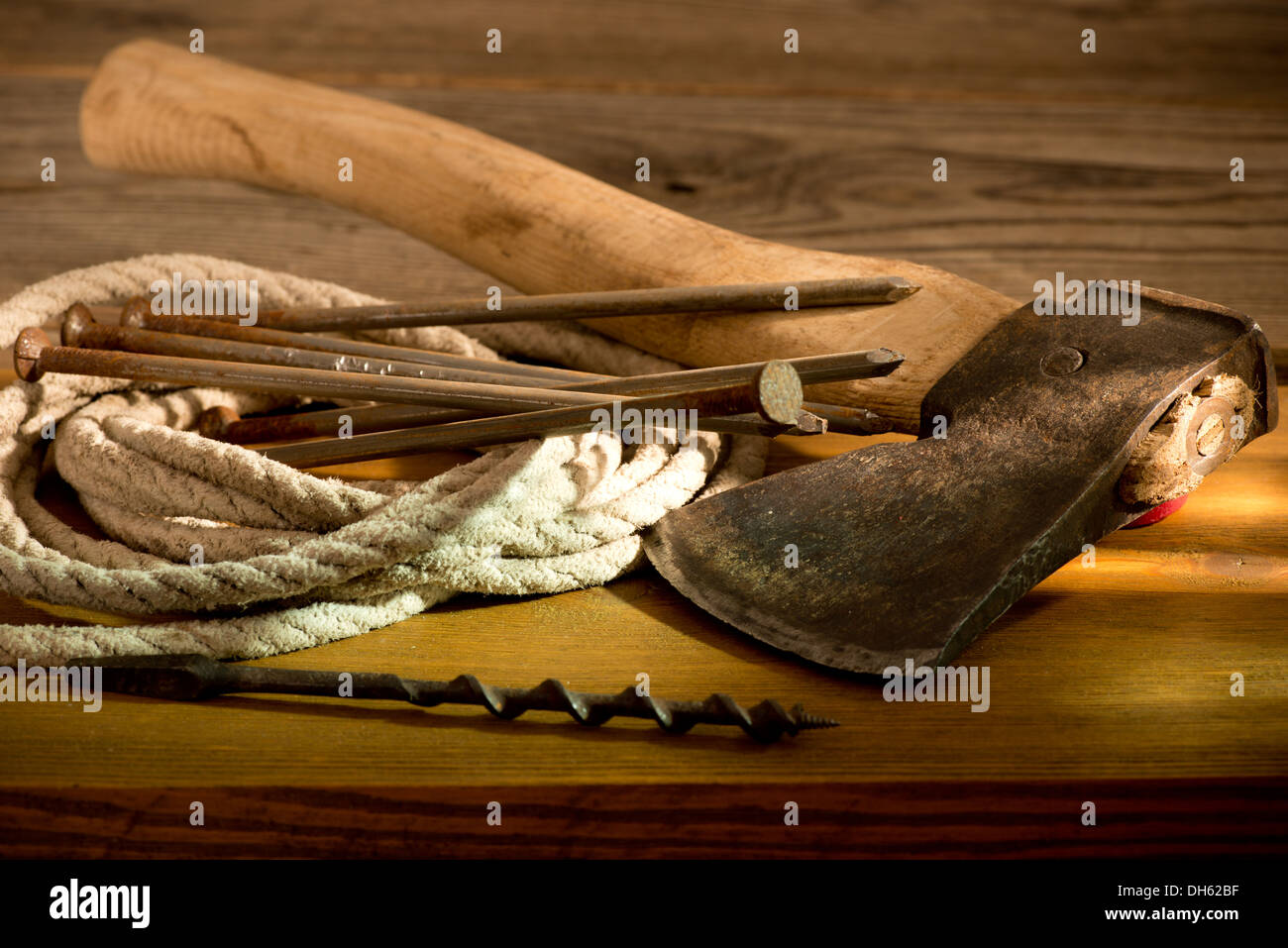 still life with a hatchet and old tools Stock Photo