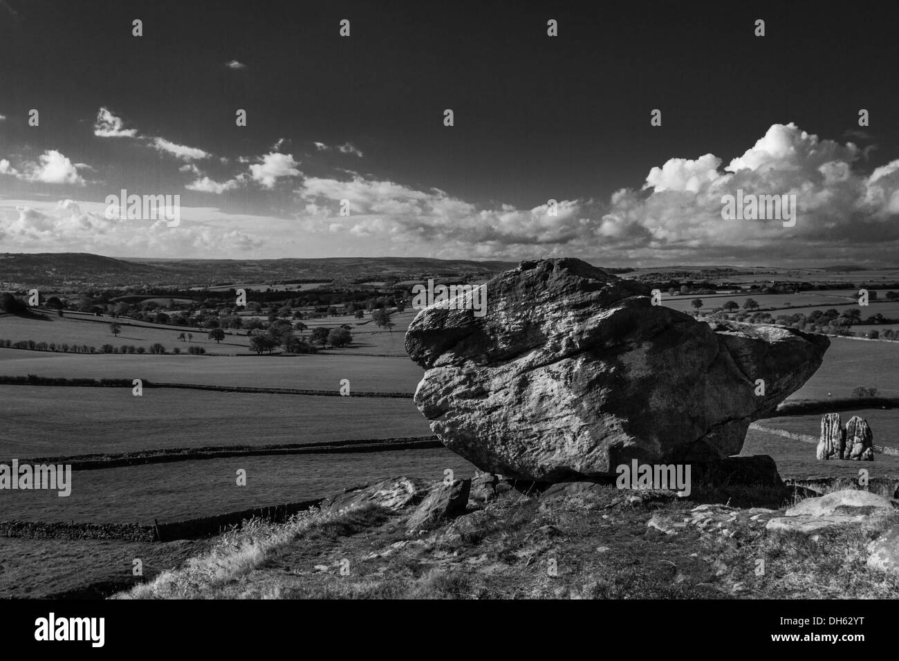 Boulder at Almscliff crag in mono, North Yorkshire Stock Photo