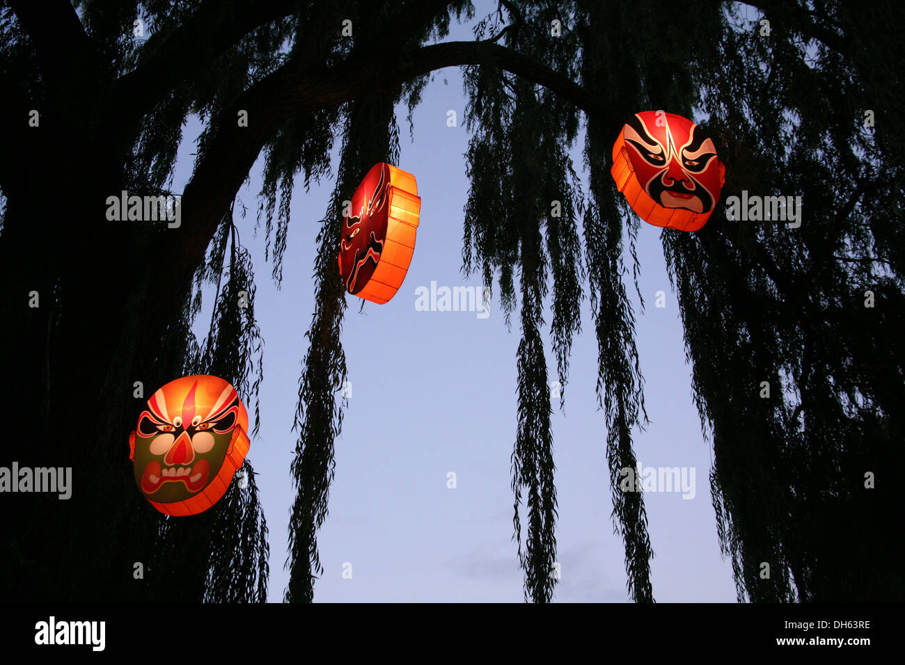 Lanterns hanging from trees in hi-res stock photography and images - Alamy