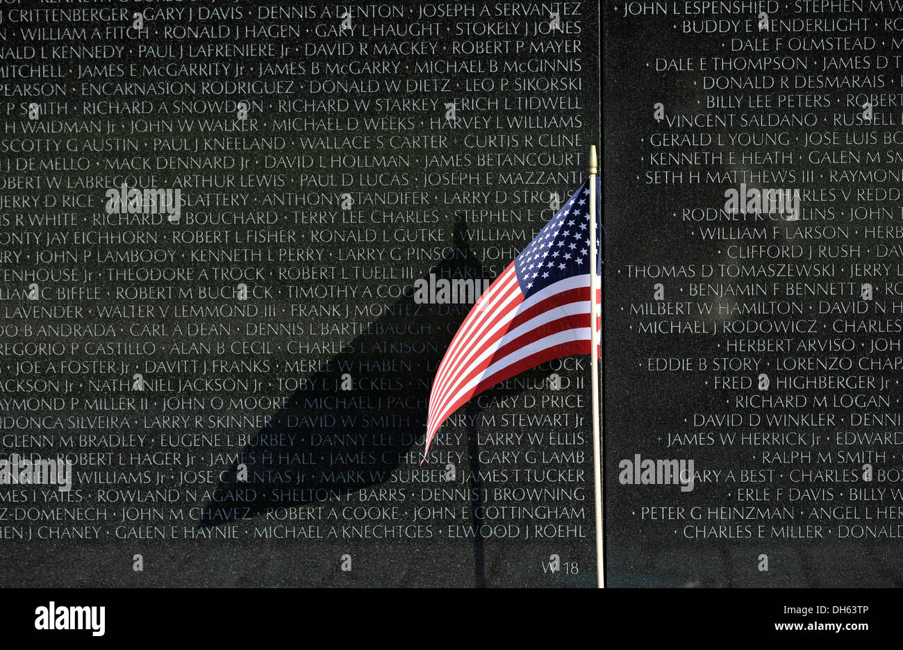 U.S. Flag flying in front of the Vietnam Veterans Memorial Wall, national  memorial with the names of the fallen U.S. soldiers in Stock Photo - Alamy, image size:1300x936